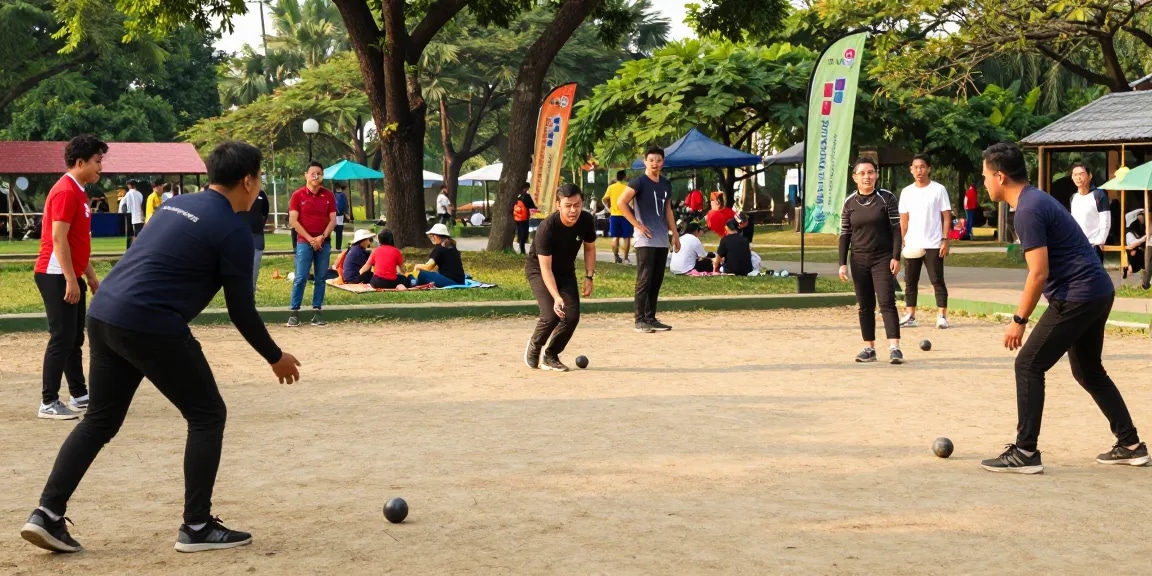 FOPI Kota Makassar dalam aksi permainan petanque di taman, menciptakan suasana komunitas yang ceria.